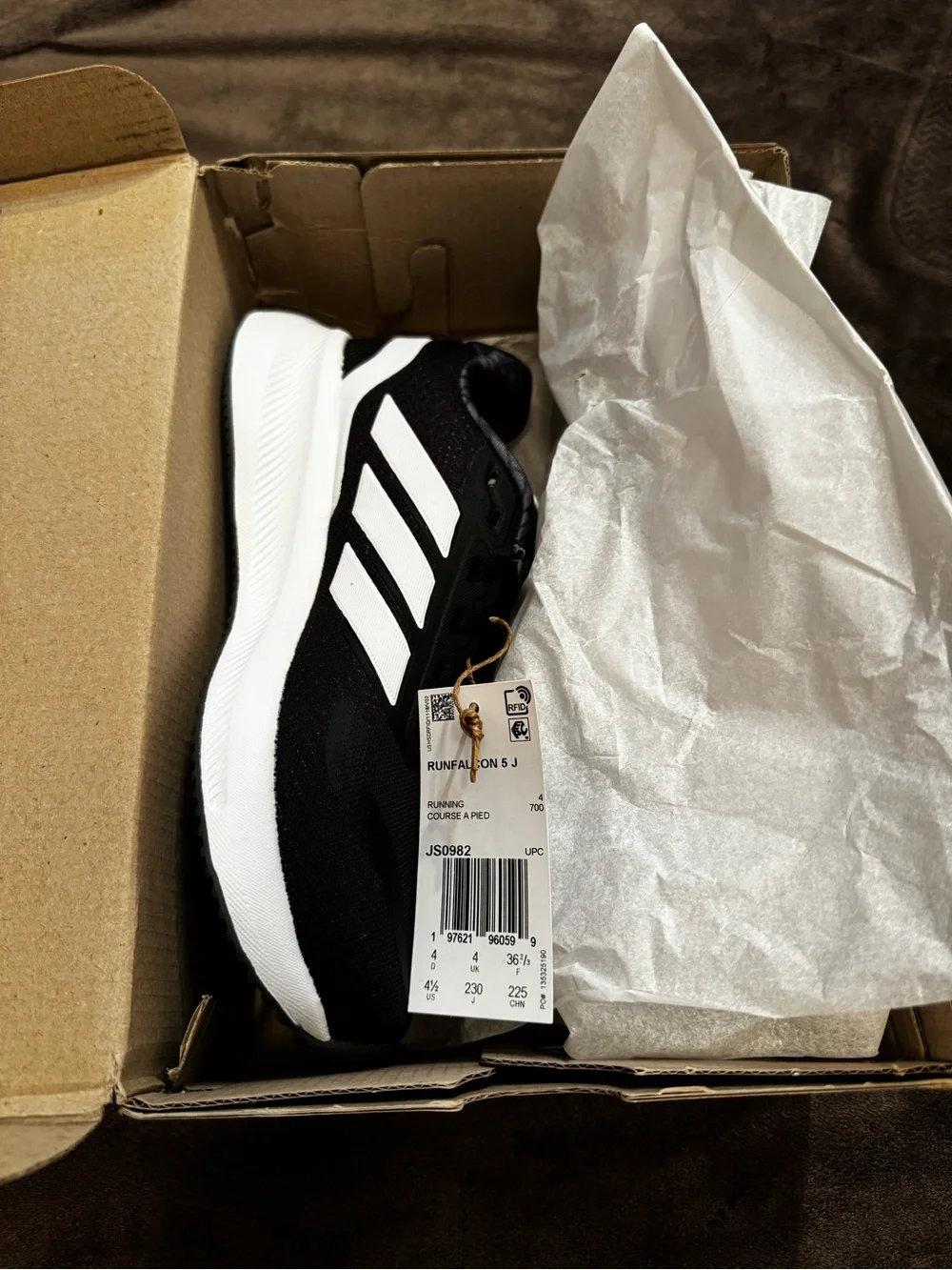 adidas Black and White Kids Running Shoe with Signature Three Stripes